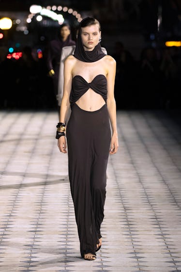 Inside Saint Laurent's Spring 2023 Program at Paris Style Week 7 A model walks the runway during the Saint Laurent Womenswear Spring/Summer 2023 show as part of Par...