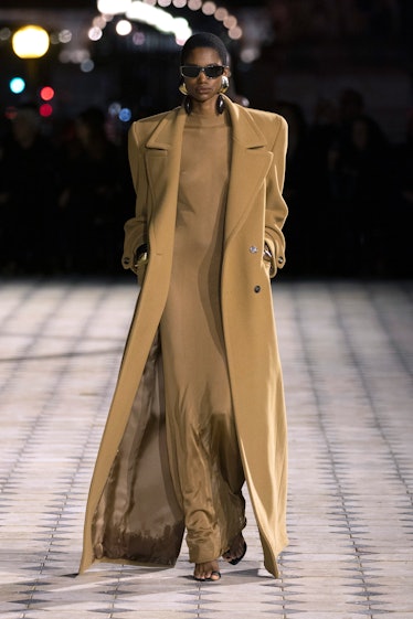 A model walks the runway during the Saint Laurent Womenswear Spring/Summer 2023 show as part of Par...