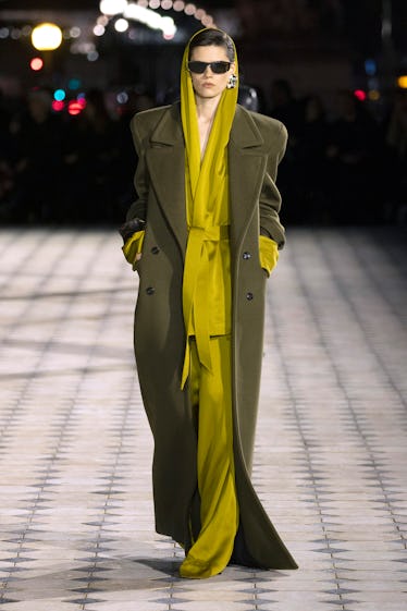 Inside Saint Laurent's Spring 2023 Program at Paris Style Week 14 A model walks the runway during the Saint Laurent Womenswear Spring/Summer 2023 show as part of Par...