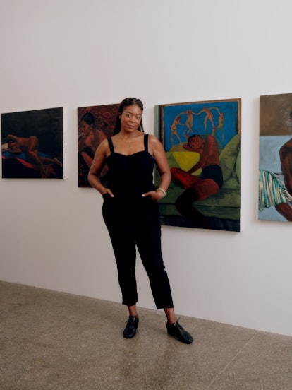 Artist Danielle Mckinney standing in her studio in Jersey City at Mana Contemporary. She wears a bla...