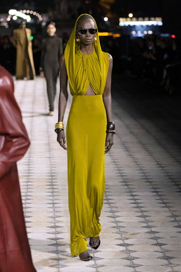 A model walks the runway during the Saint Laurent Womenswear Spring/Summer 2023 show as part of Pari...