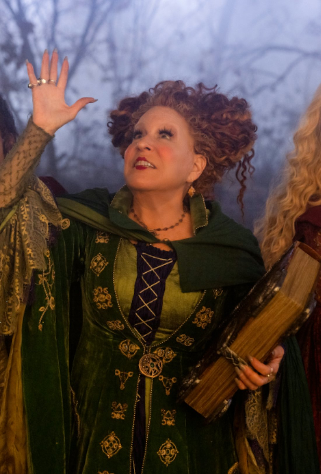The Sanderson Sisters standing side by side in a still shot from 'Hocus Pocus 2' to accompany 'Hocus...