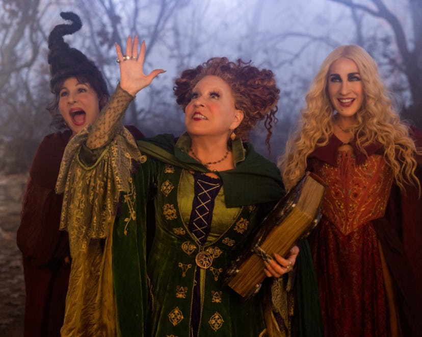 The Sanderson Sisters standing side by side in a still shot from 'Hocus Pocus 2' to accompany 'Hocus...