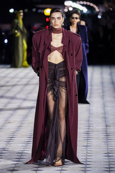 A model walks the runway during the Saint Laurent Womenswear Spring/Summer 2023 show as part of Pari...