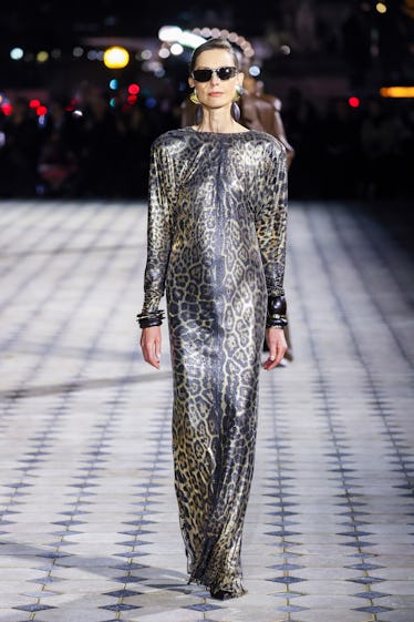 Inside Saint Laurent's Spring 2023 Program at Paris Style Week 2 A model walks the runway during the Saint Laurent Womenswear Spring/Summer 2023 show as part of Par...