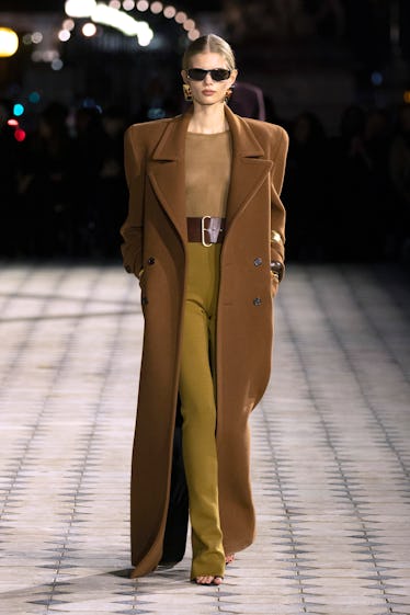 A model walks the runway during the Saint Laurent Womenswear Spring/Summer 2023 show as part of Pari...