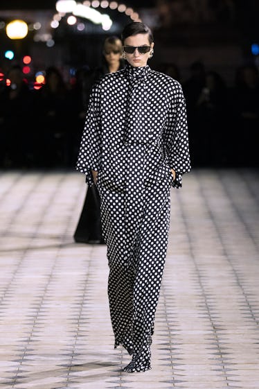 A model walks the runway during the Saint Laurent Womenswear Spring/Summer 2023 show as part of Pari...