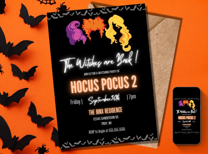A black 'Hocus Pocus 2 'party invitation on an orange background with black bats and a phone nearby ...