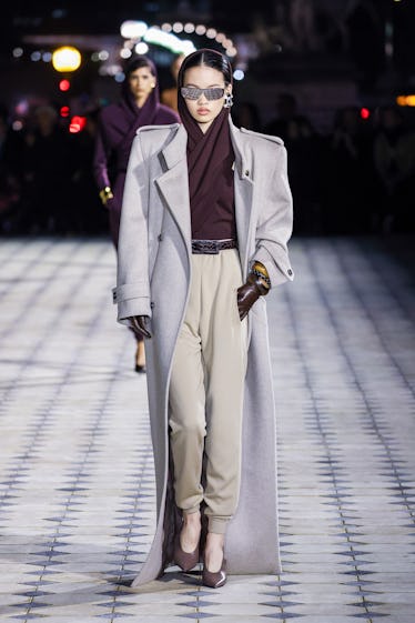 A model walks the runway during the Saint Laurent Womenswear Spring/Summer 2023 show as part of Pari...