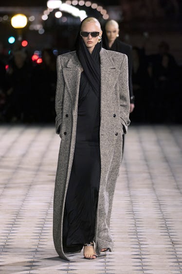 Inside Saint Laurent's Spring 2023 Program at Paris Style Week 12 A model walks the runway during the Saint Laurent Womenswear Spring/Summer 2023 show as part of Par...