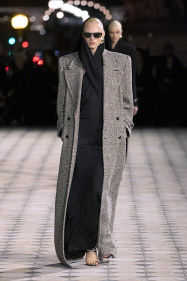 A model walks the runway during the Saint Laurent Womenswear Spring/Summer 2023 show as part of Pari...