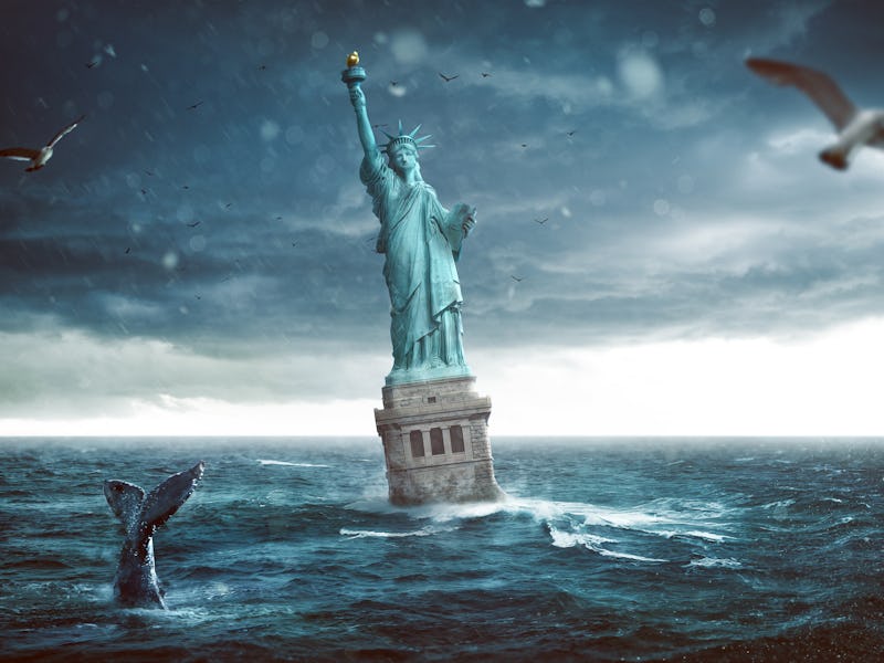 Statue of Liberty sinking into the sea
