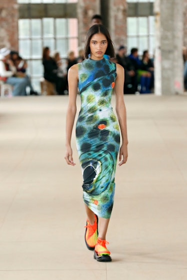 A model wearing Botter skin-tight maxi multicolored dress at the Paris Fashion Week Spring 2023.