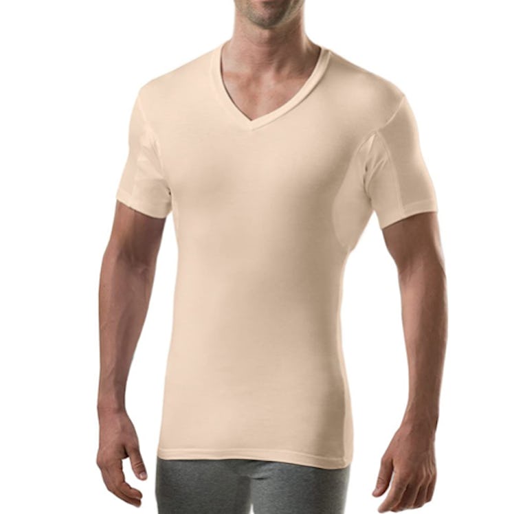A beige V-neck undershirt can be virtually invisible under a white dress shirt.