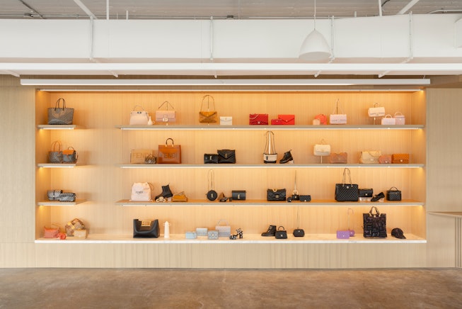 a wall of handbags at Fashionphile.