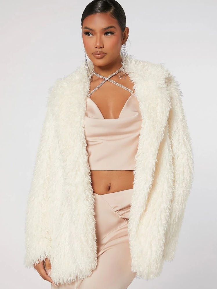 Cream faux fur coat