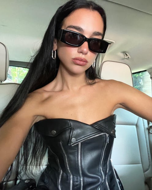 Dua Lipa wearing Dion Lee's black Biker Zip corset.