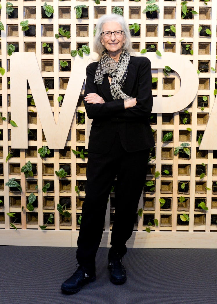 Annie Leibovitz posing at Sotheby’s Impact Gala in NYC wearing all-black combination.