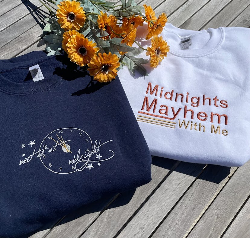These sweatshirts are part of the Taylor Swift 'Midnights' merch on Etsy.
