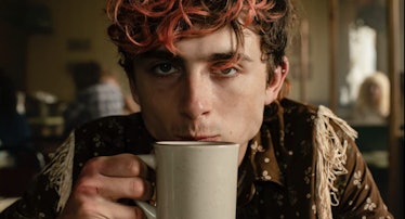 Timothée Chalamet sipping from a coffee cup in 'Bones and All'