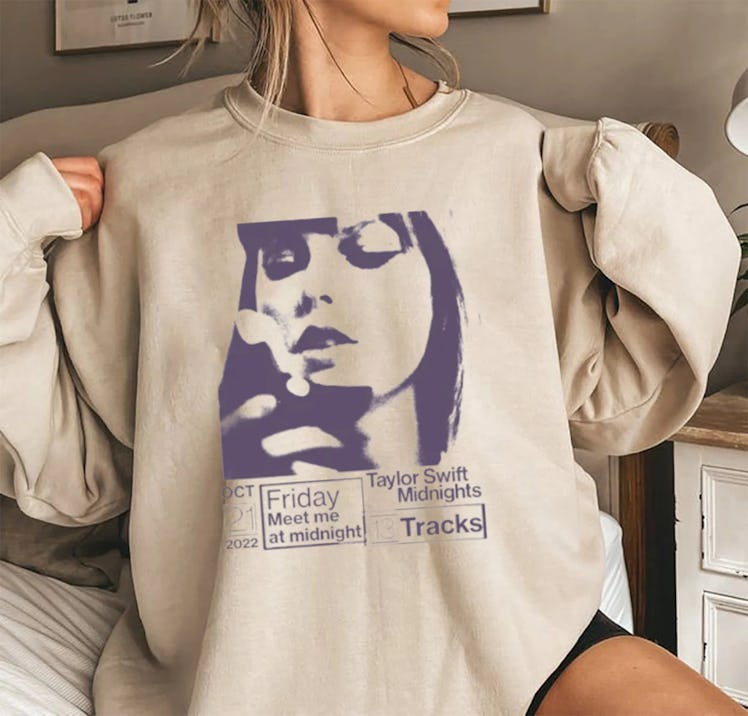 This sweatshirt is part of the Taylor Swift 'Midnights' merch on Etsy. 