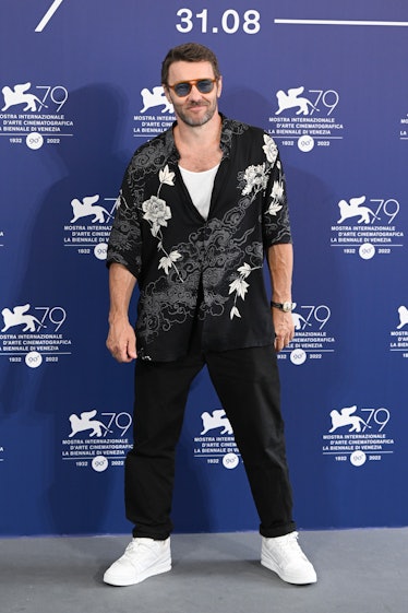 Joel Edgerton wearing black and white at the Venice Film Festival