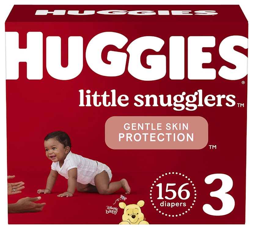 Red Huggies Little Snuggles Diaper packaging with baby crawling towards mother