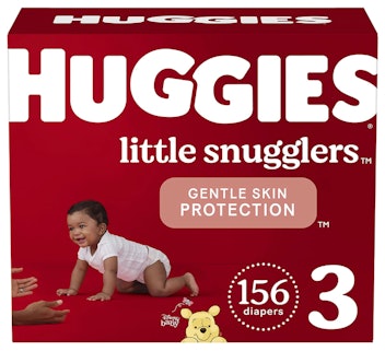 Red Huggies Little Snuggles Diaper packaging with baby crawling towards mother