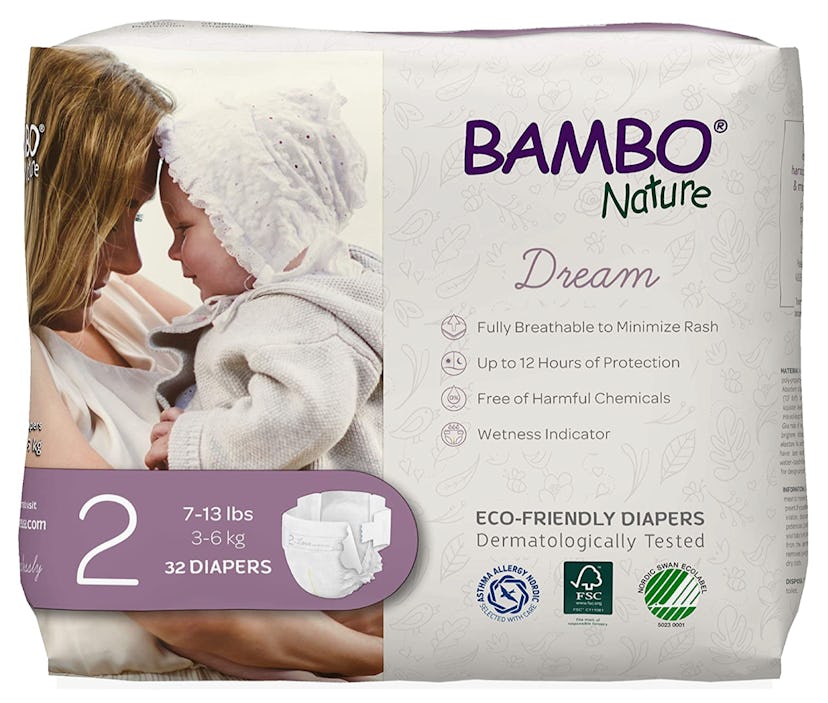 Mother and baby cuddling on Bamboo Nature Dream diapers package