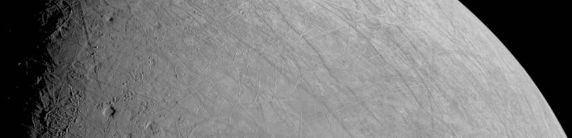 The complex, ice-covered surface of Jupiter’s moon Europa was captured by NASA’s Juno spacecraft dur...