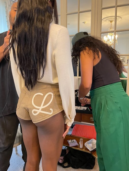 The back of Ziwe's Loewe shorts with the iconic logo
