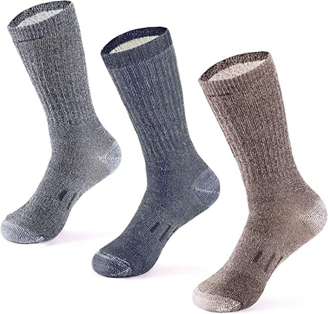 These wool walking socks come up to the mid-calf for more protection.