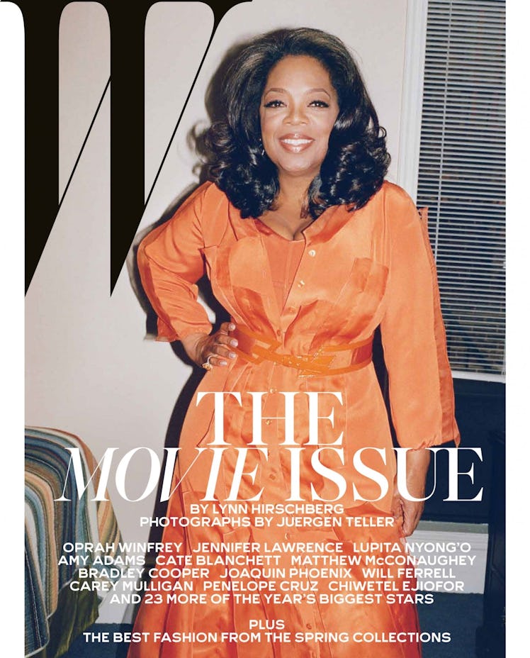 Oprah Winfrey wearing an orange dress on the cover of 'W'