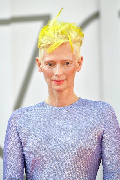 A yellow-haired Tilda Swinton at the 2022 Venice Film Festival