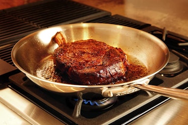An All-Clad stainless steel pan for steaks