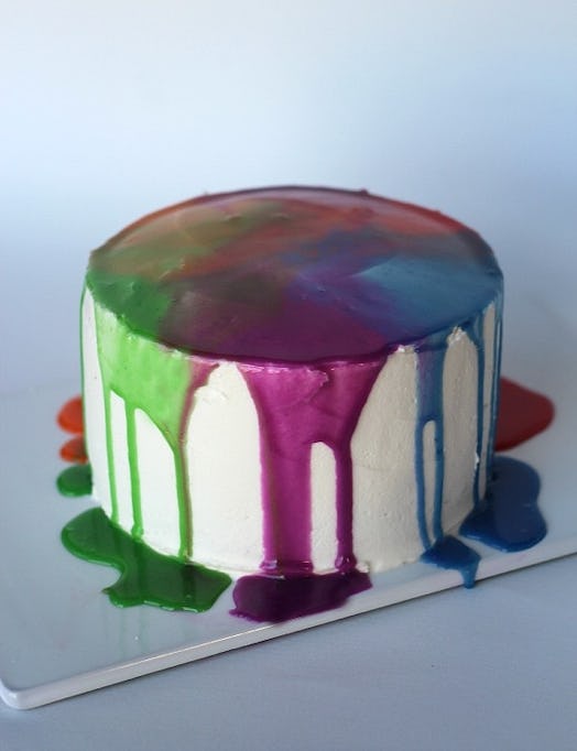Rainbow ganache cake for rainbow baby shower.