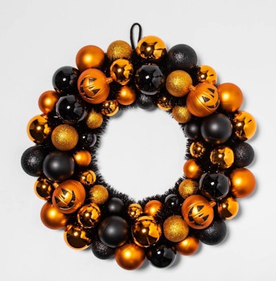 This Hyde & EEK! Boutique Pumpkin Orange and Black Shatterproof Halloween Wreath is one of the best ...
