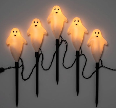 These Hyde & EEK! Boutique 5-count Incandescent Clear Ghost Halloween Pathway Stake Lights are one o...