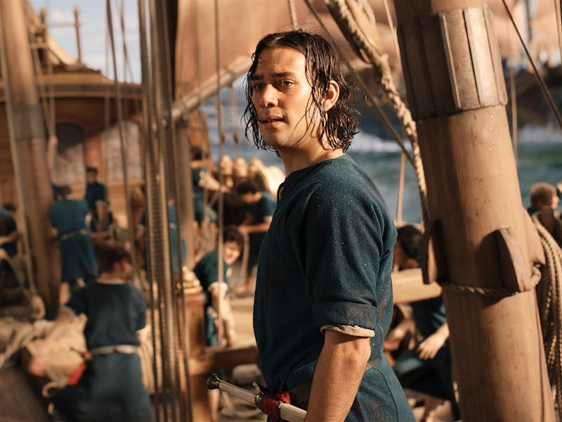 Isildur (Maxim Baldry) stands on a Númenórean ship in The Lord of the Rings: The Rings of Power Epis...