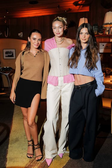 Emily Ratajkowski demonstrates the top Pants Trend is here now to keep 2 Olivia Perez, Gigi Hadid, and Emily Ratajkowski at the launch of Hadid's cashmere brand