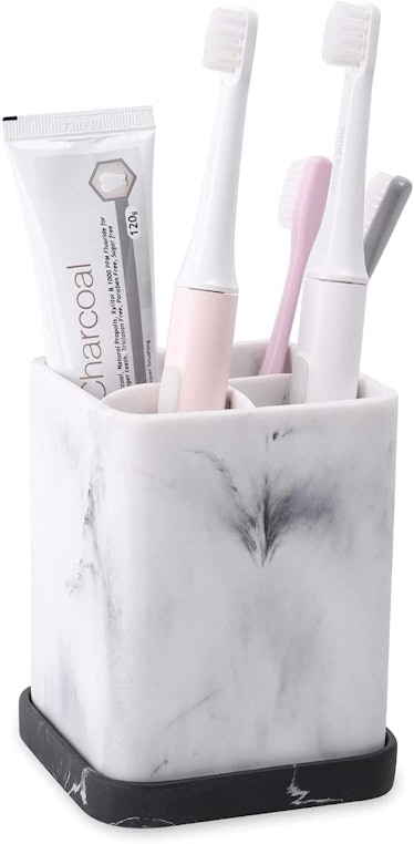 This toothbrush holder is one of the products that'll make your bathroom feel like an oasis.