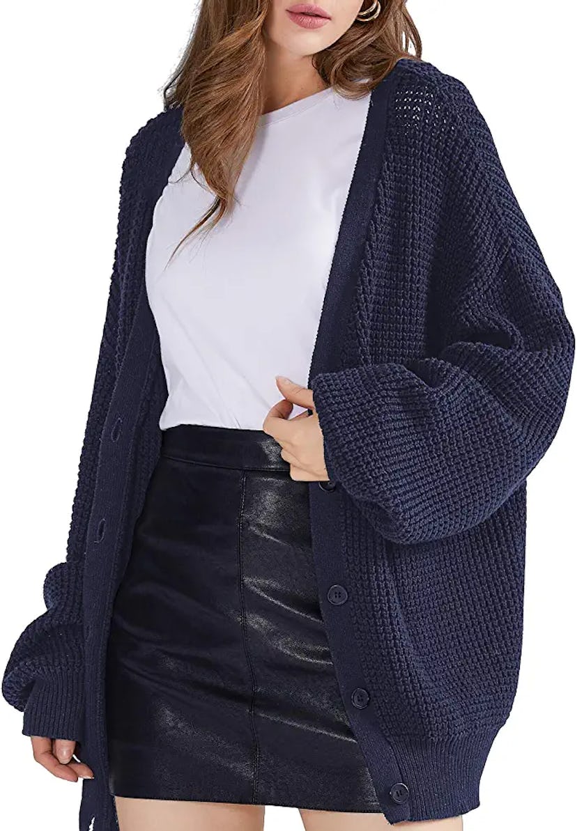 Woman wearing QUALFORT women's cardigan in navy