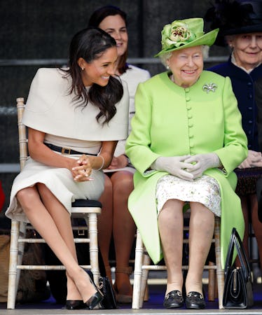Queen Elizabeth II's Greatest Style Minutes: A Visual History 16 Meghan Markle and Queen Elizabeth II laughing