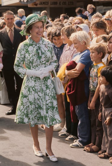 Queen Elizabeth II's Greatest Style Minutes: A Visual History 10 Queen Elizabeth wearing a patterned green dress