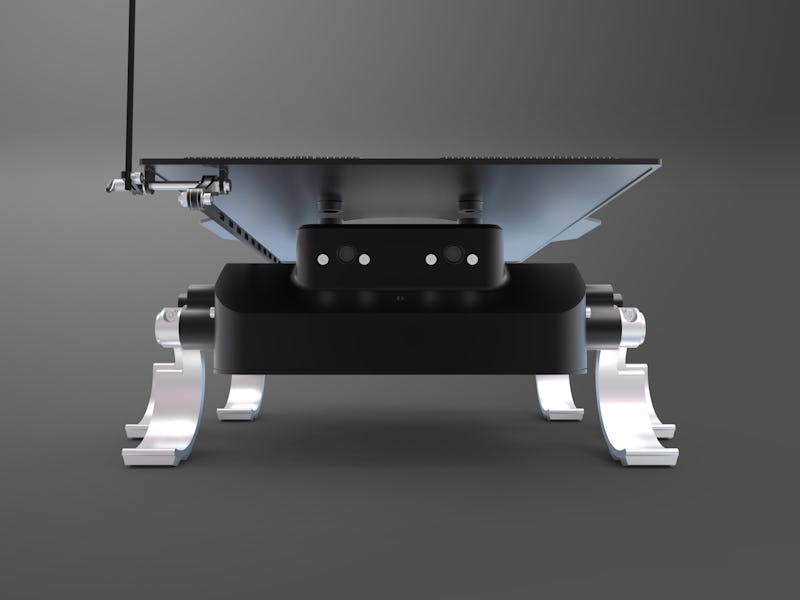 A small robot on a black background