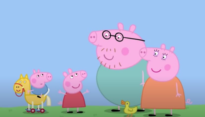 Peppa Pig and her family gather outside.