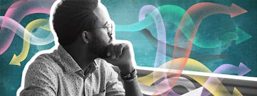 mind wandering statistics a man looking off in the distance against a colorful background of various arrows