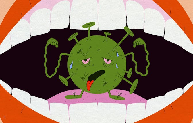 A mouth chomping on a weakened COVID variant.