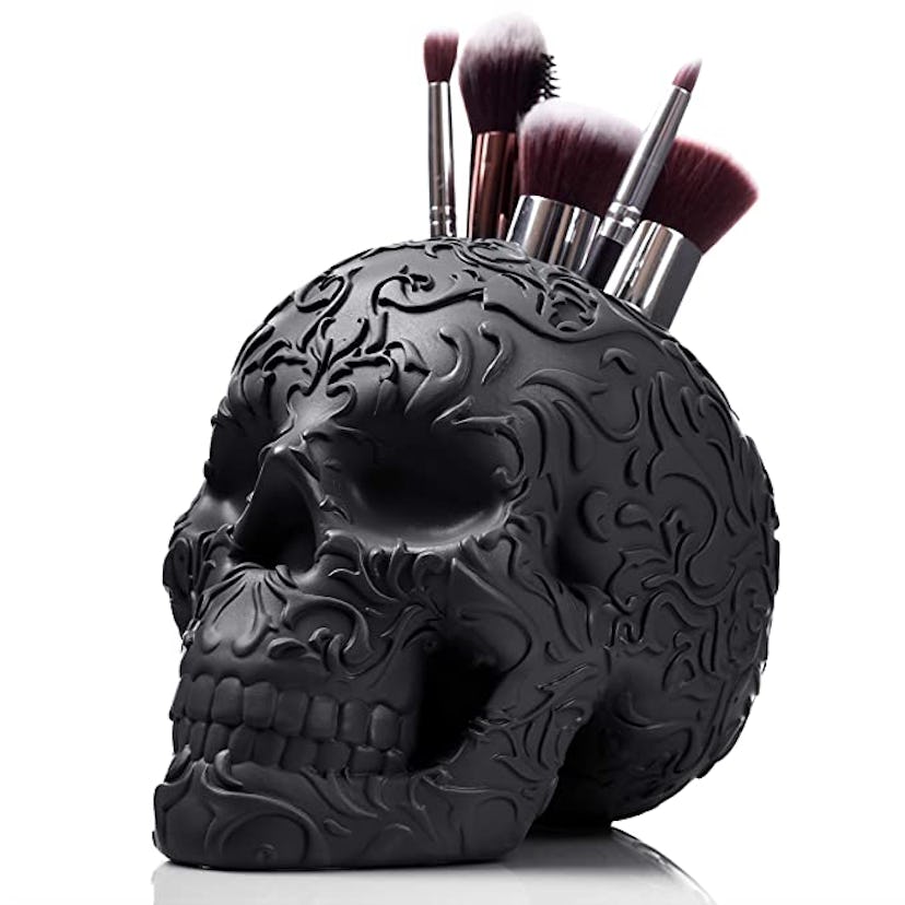 Skull makeup brush holder is a great year-round Halloween decoration.