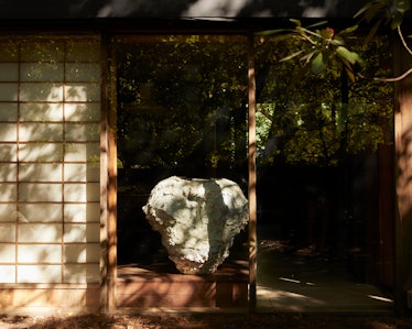 Big white vase on the porch of the Rose House